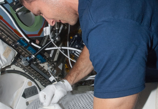 nasa2explore 11124265356 Astronaut Mike Hopkins Stores Samples in Station Freezer