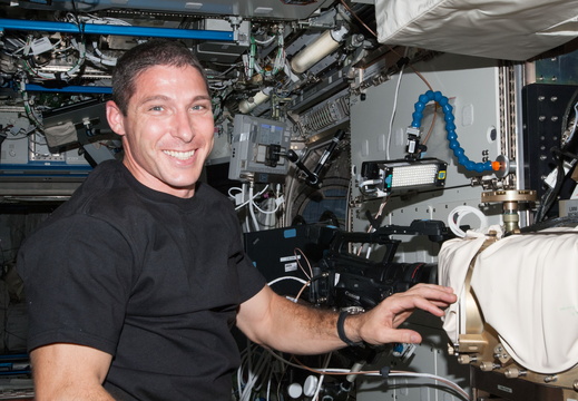 nasa2explore 11124416623 Astronaut Mike Hopkins Preps Fluids Integrated Rack
