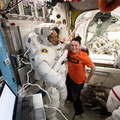nasa-astronaut-serena-aun-chancellor-assists-esa-european-space-agency-astronaut-alexander-gerst-wearing-a-us-spacesuit_44067408914_o.jpg