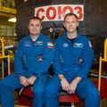 expedition-57-crew-members-alexey-ovchinin-and-nick-hague-pose-in-front-of-their-soyuz-ms-10-spacecraft_44883294772_o.jpg