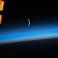 the-waxing-crescent-moon-just-above-earths-limb_33941200828_o.jpg