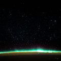 an-aurora-blankets-the-earth-beneath-a-celestial-night-sky_49426692807_o.jpg