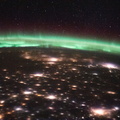 nasa2explore_50863367551_City_lights_and_an_aurora_above_Russia.jpg