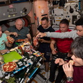 expedition-67-crew-members-enjoy-pizza-during-dinner-time_52117689150_o.jpg
