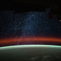 the-milky-way-is-pictured-above-earths-atmospheric-glow_52134731479_o.jpg