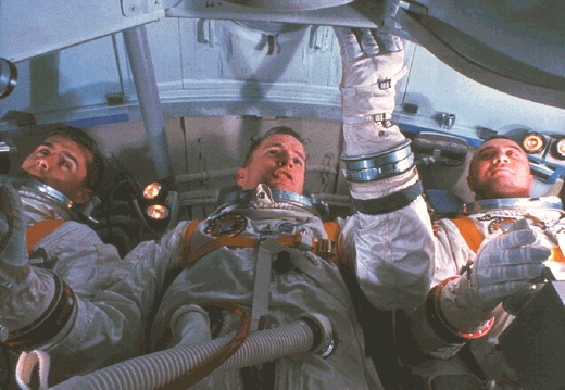 Astronauts for the first Apollo Mission practice for the mission in the Apollo Mission Simulator