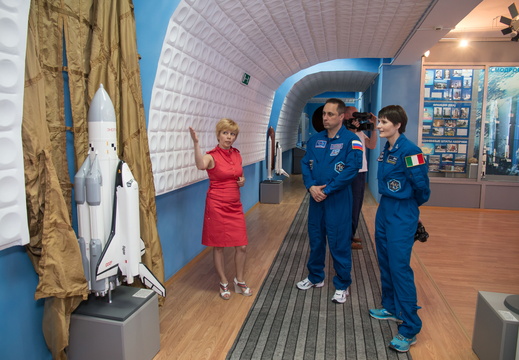 13-11-08-2 In the history museum at the Baikonur Cosmodrome in Kazakhstan, Expedition 40 41 backup crewmembers Anton Shkaplerov of the Russian Federal Space Agency (Roscosmos, center) and Samantha Cristoforetti  o