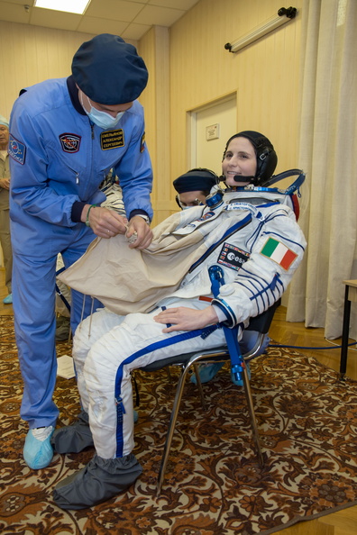 15-02-29_At the Baikonur Cosmodrome in Kazakhstan, Expedition 40_41 backup Flight Engineer Samantha Cristoforetti of the European Space Agency suits up in her Russian Sokol launch and entry suit May 16 for a dre_o.jpg