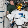 Astronaut Chris Cassidy Works With Robonaut - 9203547716_9cc3aaa977_o.jpg