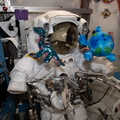 a-us-spacesuit-is-pictured-with-plush-doll-mascots_50040951581_o.jpg