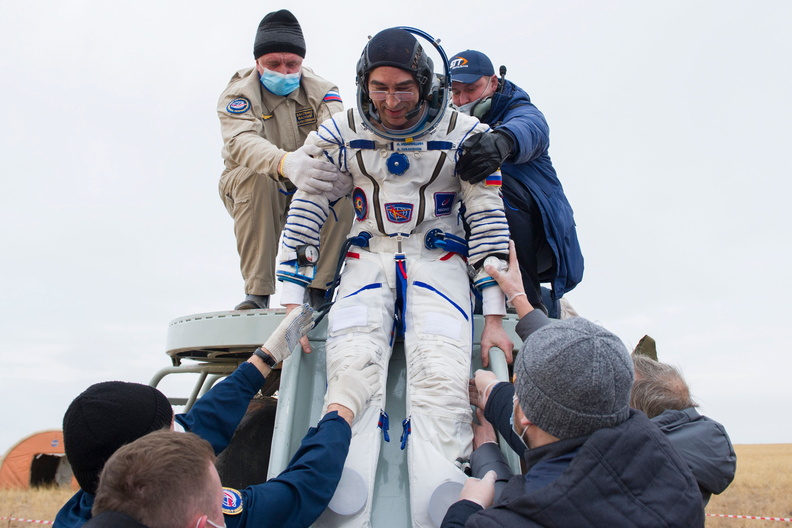 cosmonaut-anatoly-ivanishin-is-helped-out-of-the-soyuz-ms-16-spacecraft_50520314778_o.jpg