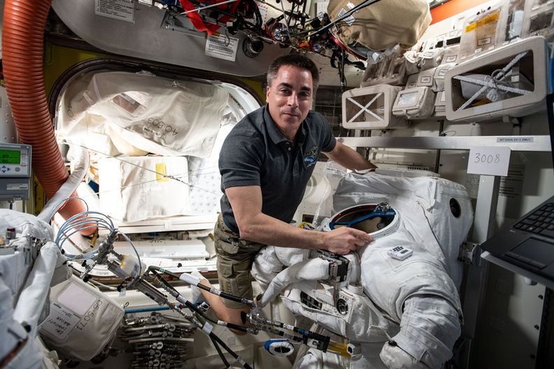 expedition-63-commander-chris-cassidy-works-on-a-us-spacesuit_50520779317_o.jpg