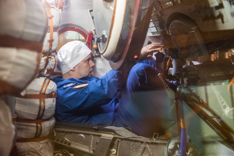 ivan-vagner-of-roscosmos-runs-through-procedures-during-a-pre-launch-training-session-in-the-soyuz-ms-16-spacecraft_49698694532_o.jpg