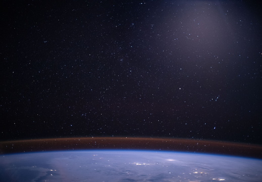 the-atmospheric-glow-above-earths-moonlit-horizon 49672289728 o