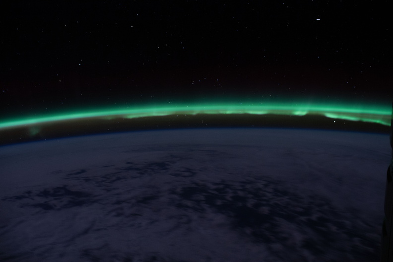 the-aurora-australis-hovers-above-the-earths-horizon_49778677806_o.jpg