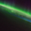 nasa2explore_51003517137_An_aurora_glows_above_the_Earths_horizon.jpg