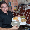 nasa2explore_11209382213_Astronaut_Mike_Hopkins_With_Thanksgiving_Meal.jpg